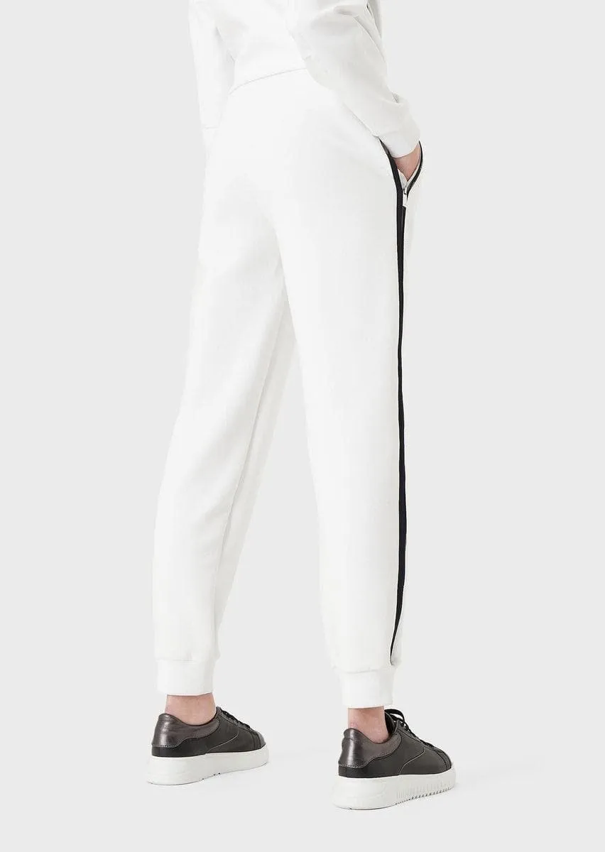 Pantaloni jogger in double jersey con tape logo e zip laterale