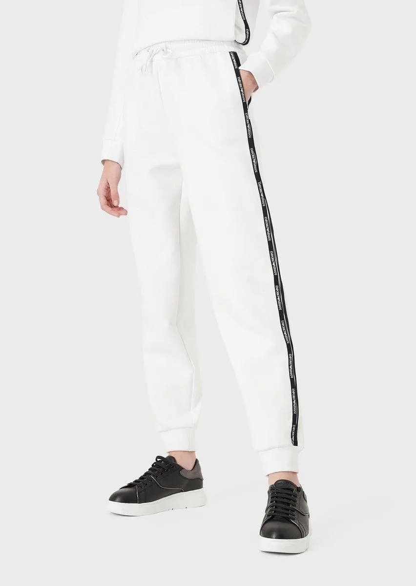 Pantaloni jogger in double jersey con tape logo e zip laterale